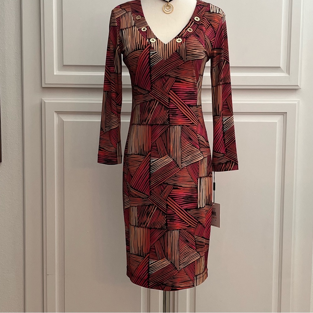 This is a brand new beautiful Calvin Klein dress in size 2 NWT